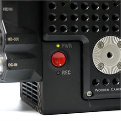 RED Epic-W Helium 8K camera body serial no. 13024E6A9, with RED EVF, three RED Mini Mag 512GB cards, one 480 Mini Mag card and reader, two RED V-Mount batteries and charger, RED top handle, Wooden Camera Easy Top top plate and one other top plate, various accessory cables, Wooden Camera bridge plate for 19mm studio rods, 12 inch Wooden Camera Dovetail plate and four 19mm studio rods to include two 380mm and two 610mm, with original Epic-W camera box and contained within a custom cut flight case