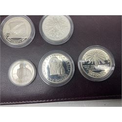 Five United States of America commemorative silver proof coins, comprising 1986, 1987, 1989, 1992 one dollars and 1982 half dollar, all with certificates