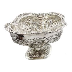 Silver table centre piece, embossed foliate and open fretwork decoration hallmarked S C Younge & Co, Sheffield 1827, with later modification (re-struck by the London Assay office 2021), approx  45.1oz, height 23cm