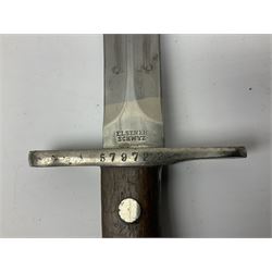 British Enfield 1907 model SMLE bayonet, with 43cm fullered steel blade and metal mounted leather scabbard L58cm overall; and Schmidt-Rubin Model 1918 bayonet the 30cm steel blade marked Elsener Schwyz No.579722; in steel scabbard with leather frog marked G. Bertolini Sellaio Vira/G.Tic 79 L45cm overall (2)