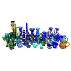 A group of 19th century and later coloured glassware, mostly green and blue, including a small number of Bohemian examples, to include various vases, drinking glasses, etc. 