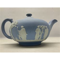 Late 18th/early 19th century pale blue Wedgwood Jasperware tea service, decorated in relief with classical scenes, comprising teapot, lidded twin handled sucrier and milk jug, all impressed Wedgwood beneath, tallest H11cm
