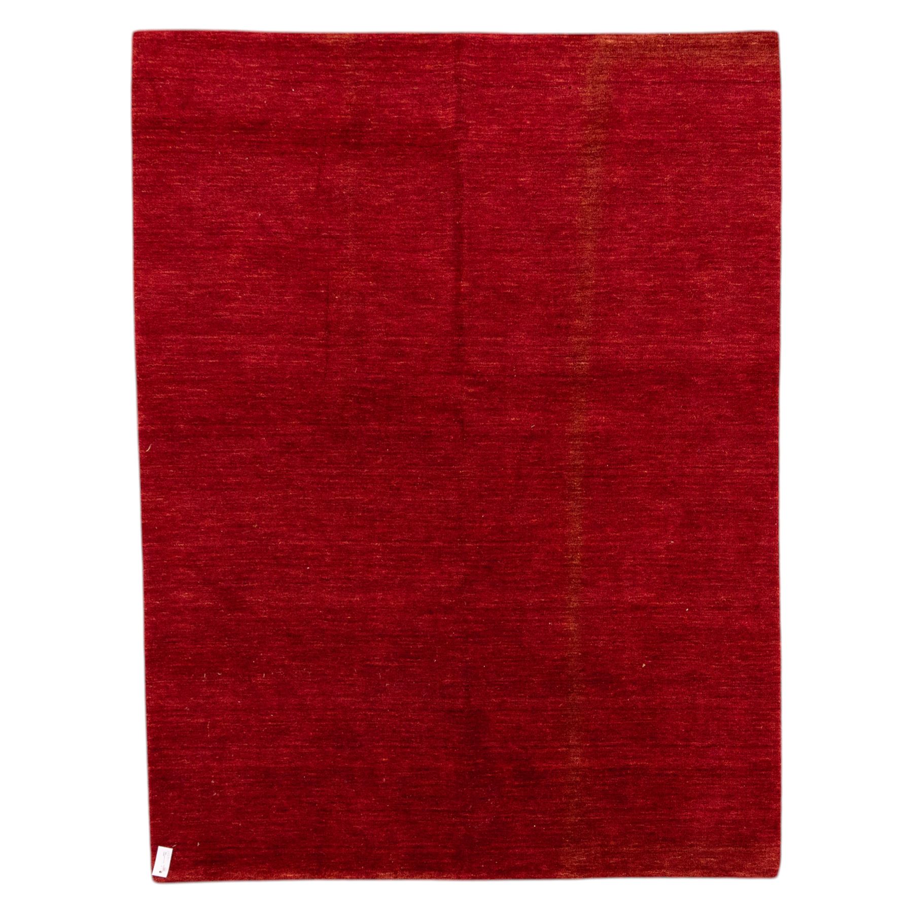 Two contemporary Moroccan Berber hand-woven rugs, deep madder red field of plain design, 199x153cm, other with deep madder red field with a simple lattice of ivory lines forming panels with some tonal variation, 190x146cm 