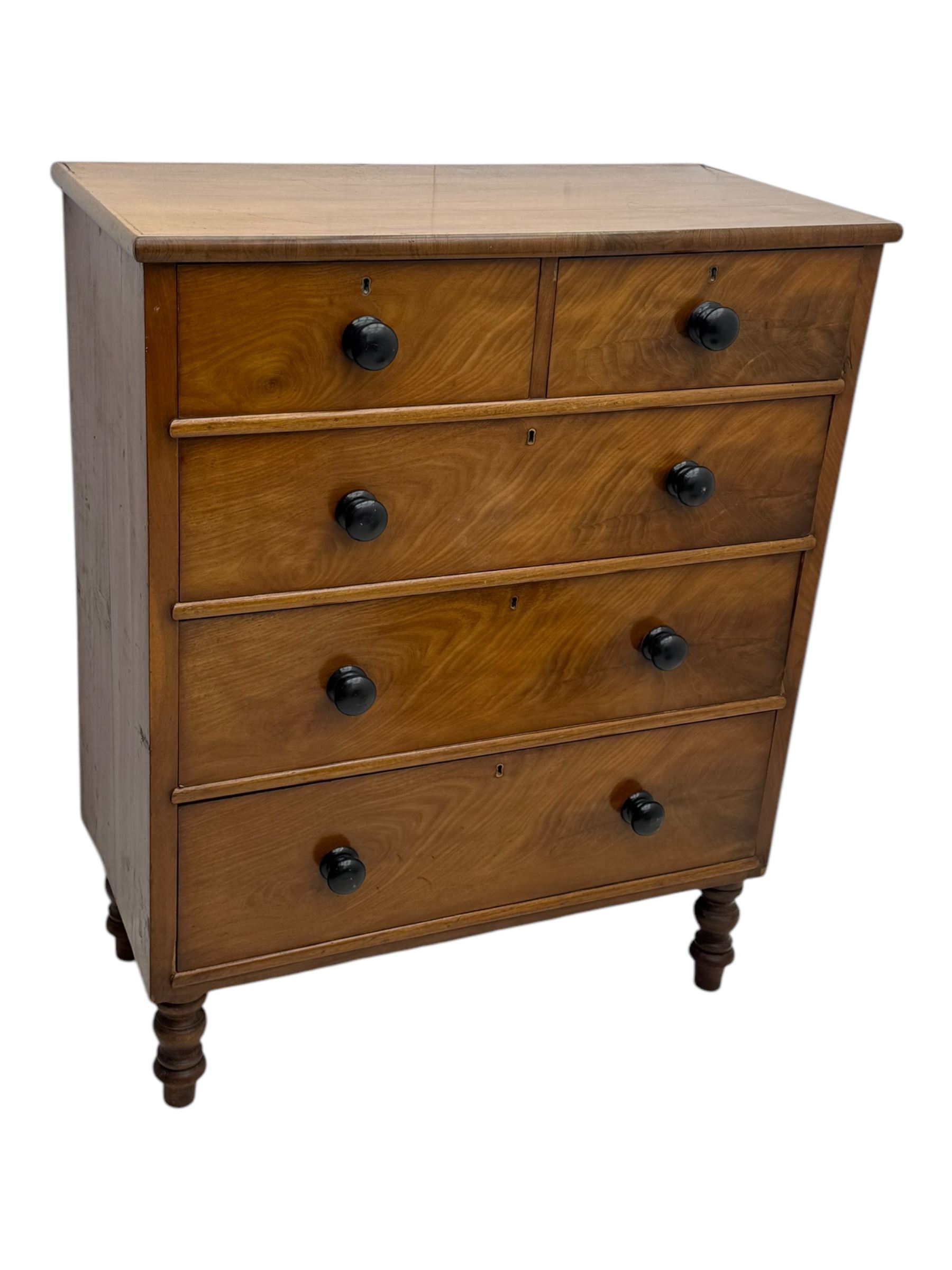 Late Victorian mahogany chest of drawers, with rectangular top over two short and three long graduated drawers, each fitted with ebonised turned knob handles and keyholes, raised on turned supports