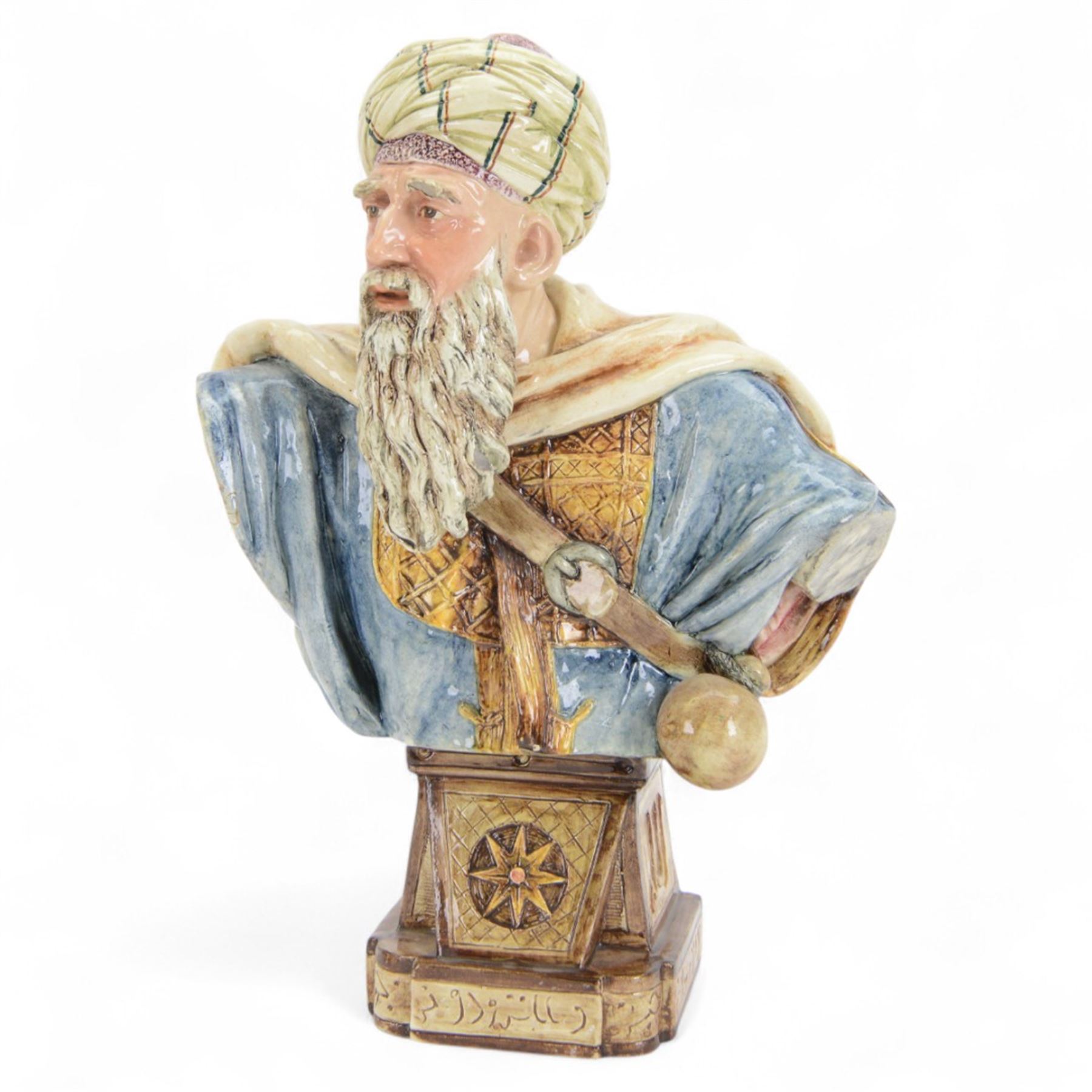 Pair of 19th century German majolica busts, modelled after biblical figures, as a male and female figure in Eastern dress, upon a plinth detailed with script, impressed marks verso 'Gesetz Geschützt' , H37cm