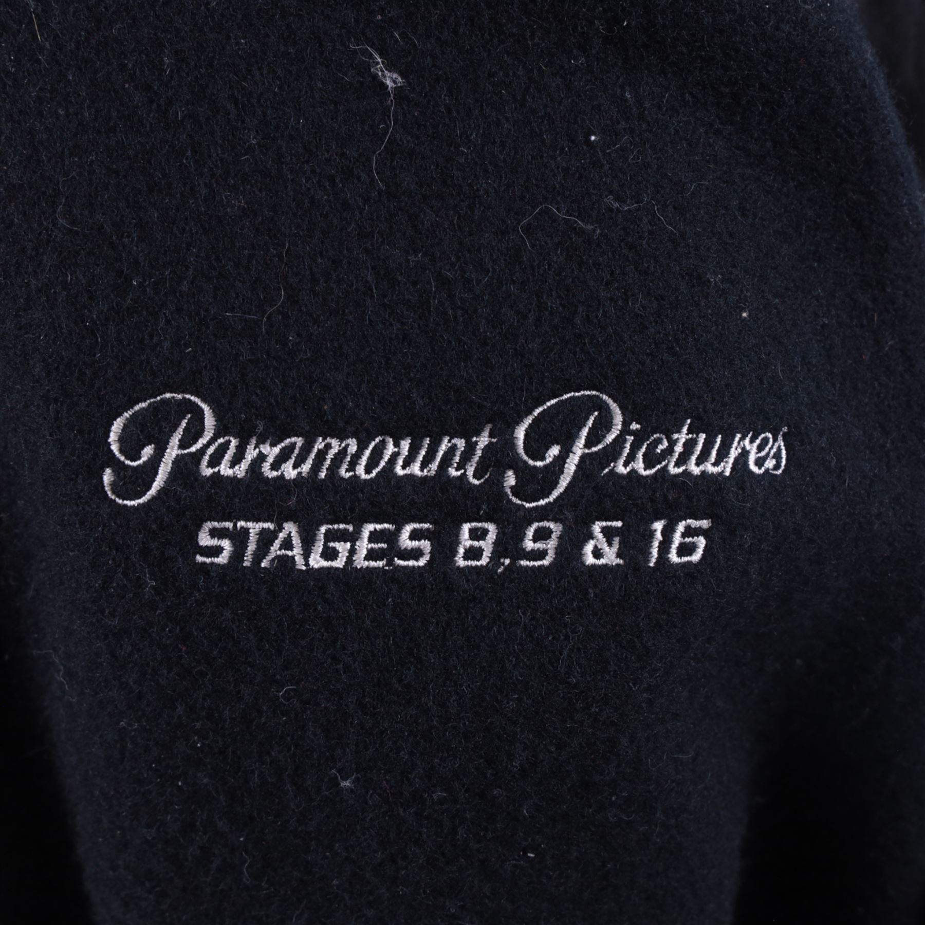 Star Trek The Next Generation 10th anniversary jacket, leather sleeves and collar with embroidered decoration throughout, including 10th anniversary emblem to back, 'Star Trek The Next Generation' to collar, 'Paramount Pictures Stages 8,9 & 16' to front and seven character names to interior, in size XXXXL, purchased in 1990s from Star Trek Experience Las Vegas