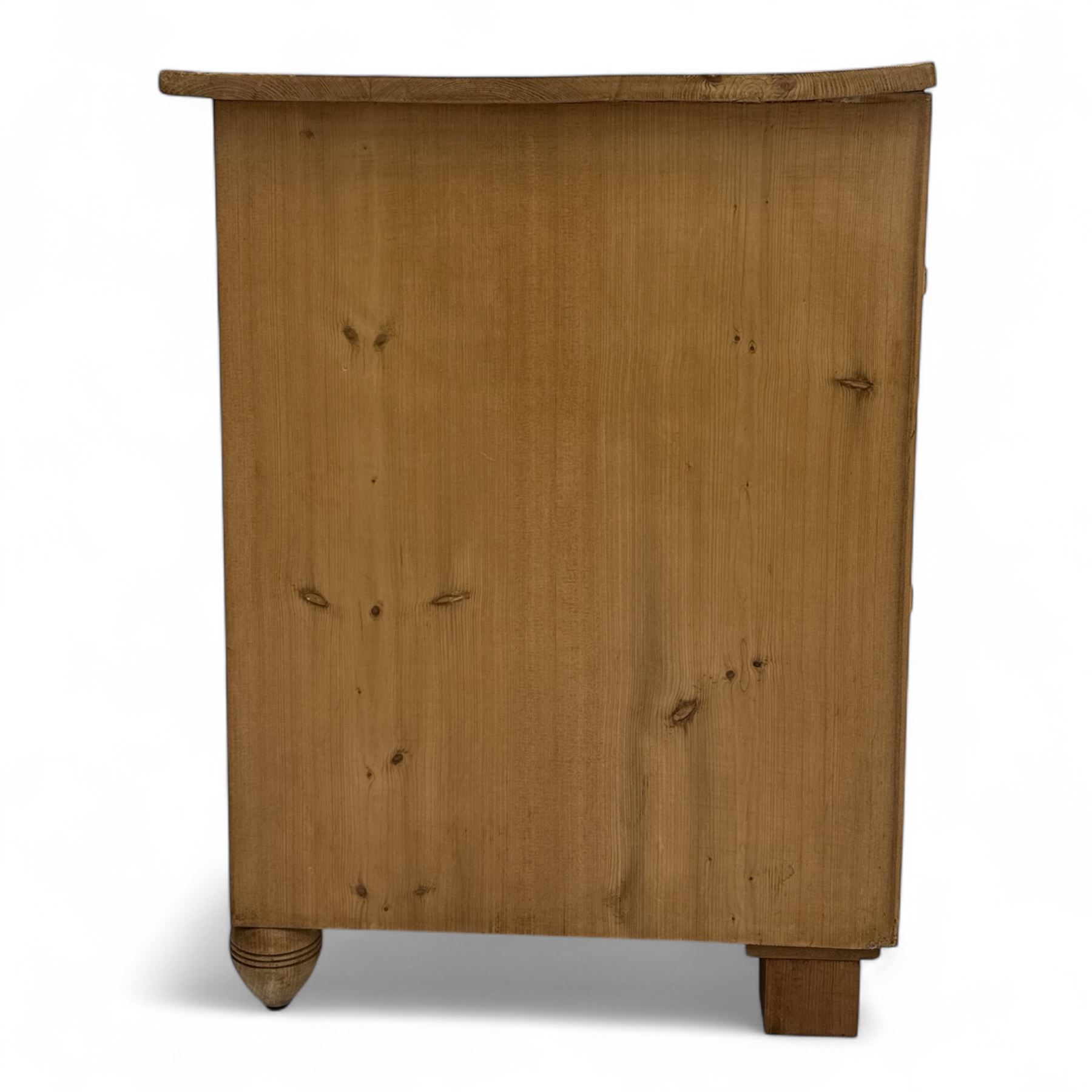 19th century pine chest of drawers, rectangular top over two short and two long drawers with oval pressed brass backplates and drop handles, panelled sides, rounded front edges, on compressed bun feet