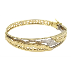  Asian 18ct white and yellow gold open work hinged bangle, stamped 750, approx 11.7gm  