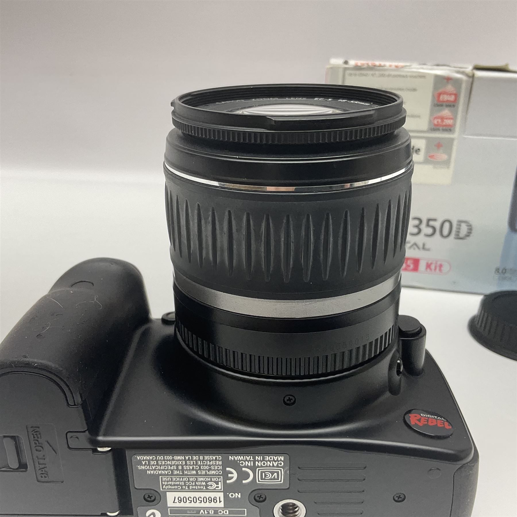 Canon EOS Digital Rebel camera body, serial no. 1960505067, with 'Canon Zoon EF-S 18-55mm 1:3.5-5.6 II' lens, in original box 