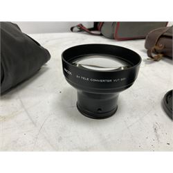 Quantity of cameras and accessories to include Olympus Trip 35, Minolta A f-EII 35mm, Yashica Auto Focus camera, Hanimex 35mm af camera in case, Kodak No.2A Folding Pocket Brownie camera in case, Minolta VLT-501 lens, etc