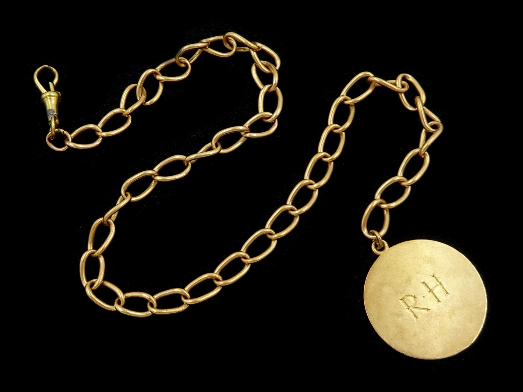 Early 20th century 9ct gold watch chain, with later 9ct gold fob initialled R.H and 18ct gold clip