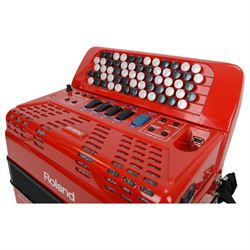 Rolan FR-1X  V-accordion, 13 fold bellows, 62 butttons, classic, jazz, ensemble, brass, wind, piano and guitar, samples. With leads and carrying case.