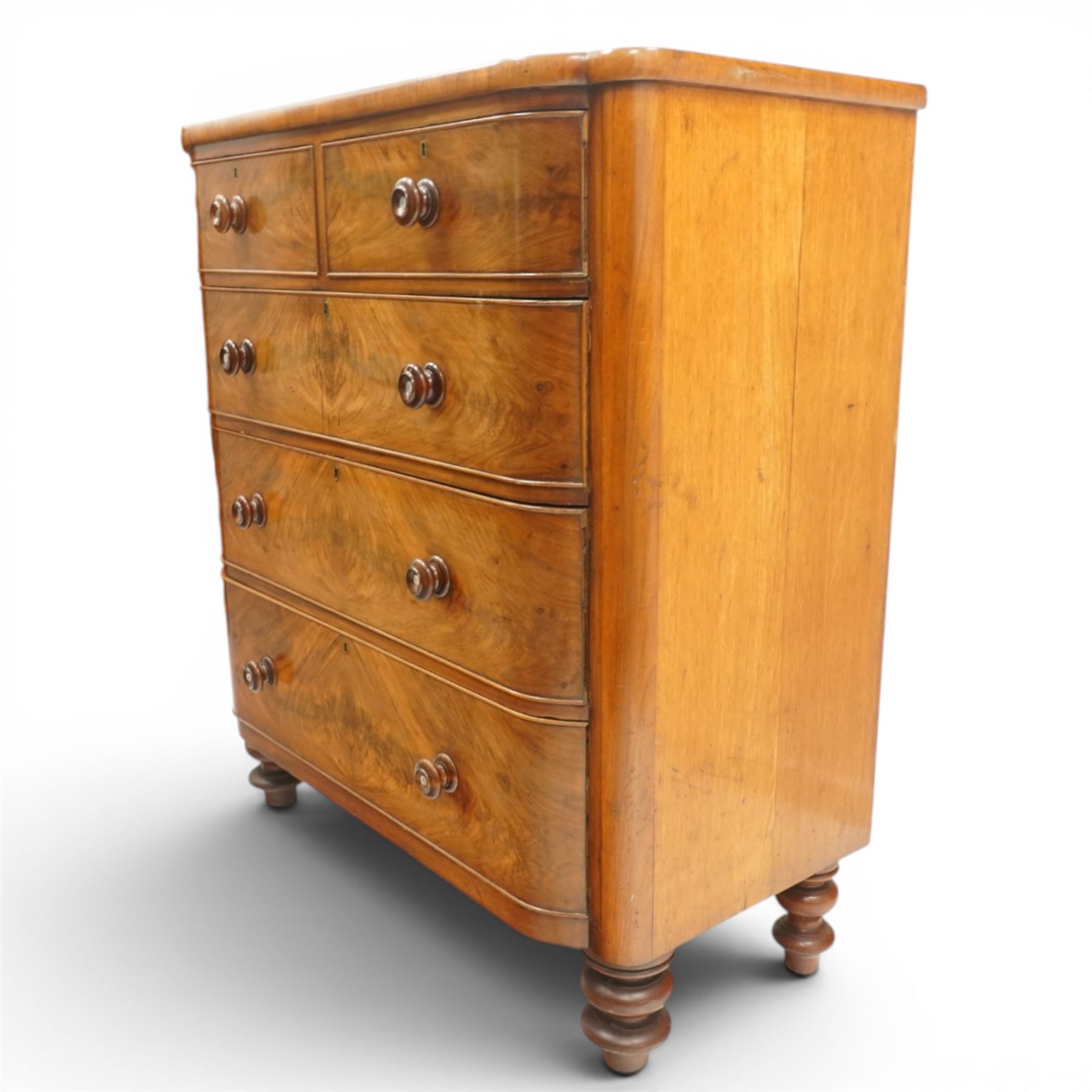Victorian mahogany bowfront chest, with mahogany veneered drawers two over three drawers, turned handles with mother of pearl centres, raised on turned supports