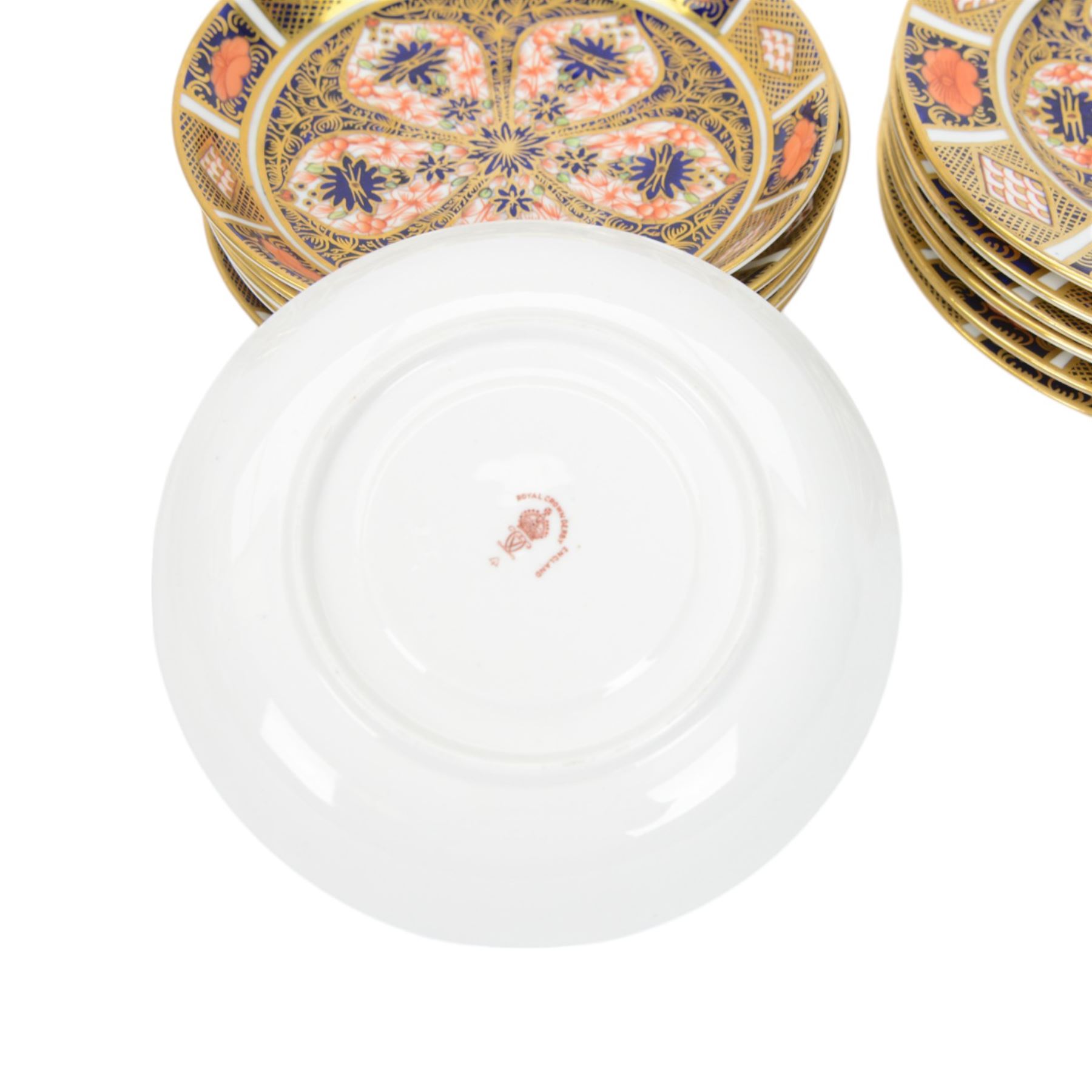 Royal Crown Derby tea service for six in Imari 1128 pattern, comprising teacups and saucers, side plates, sandwich plate, milk jug, open sucrier and cake slice 