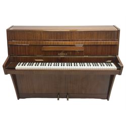 Kemble - upright piano in lacquered mahogany case, iron framed and over strung, together with duet piano stool