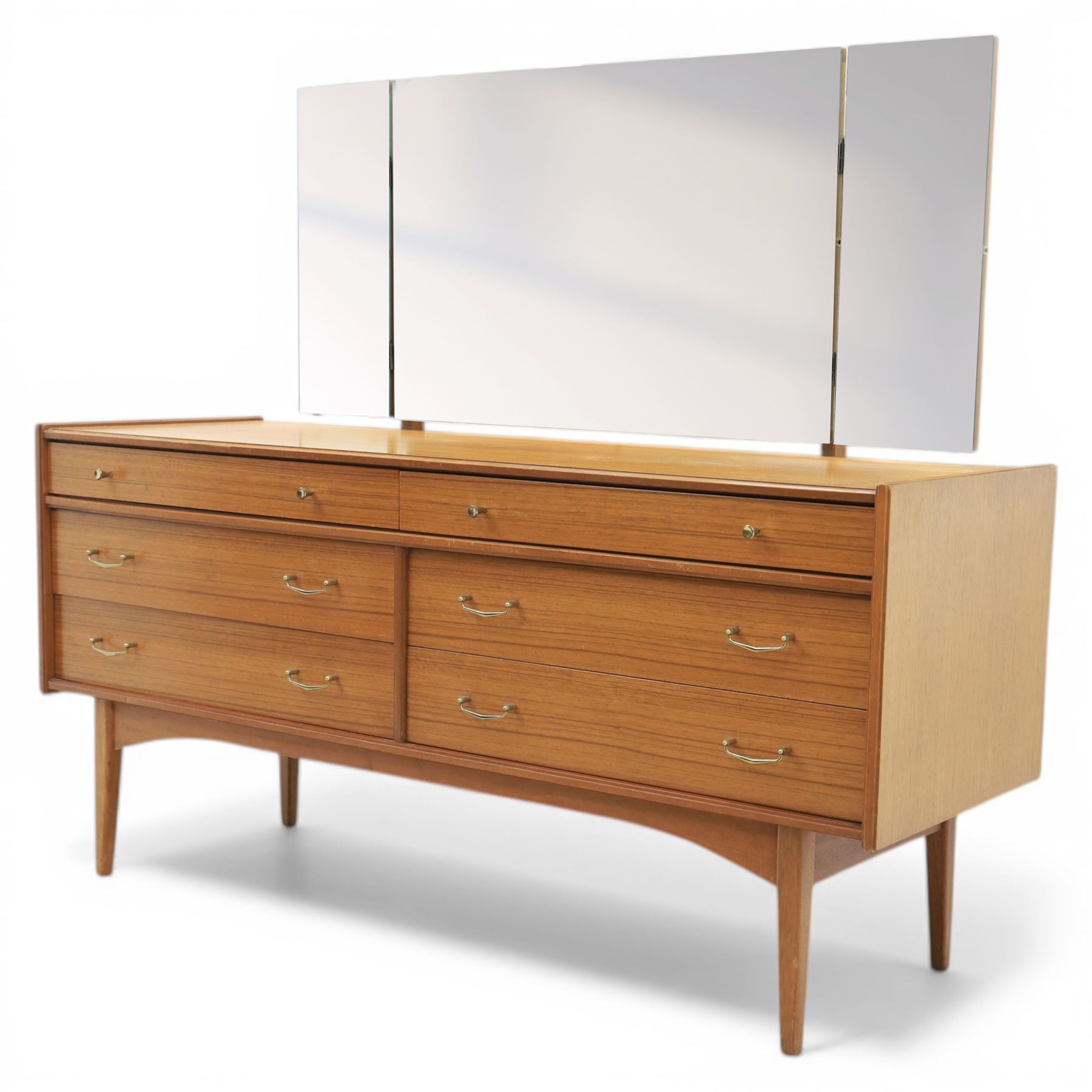 Golden Key By Palatial Ltd - mid-20th century teak dresser, three part mirror above a rectangular top, with six drawers with brass handles and pulls, upon splayed tapering legs 
