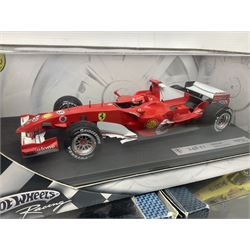 Five Mattel Hot Wheels 1:18 scale die-cast racing cars - Ferrari 248F1 Michael Schumacher, Renault F1 Team R25 Fernando Alonso, Williams F1 Team Williams FW28 Mark Webber, Jordan 199 Damon Hill and Williams F1 Team BMW; all boxed (5)