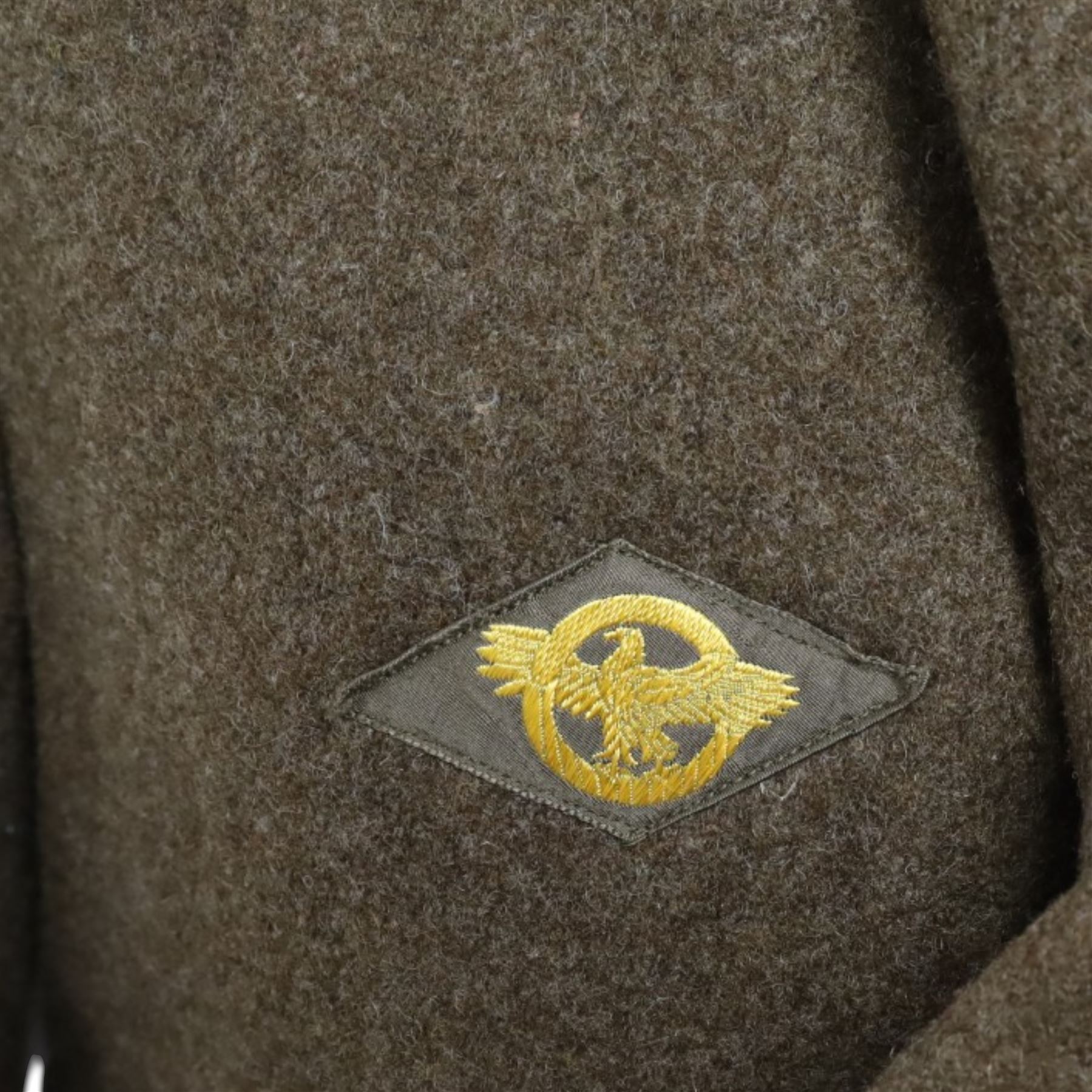 Army long wool jacket, with US Army WWII 82nd Airborne division patch, stamped inside 36R