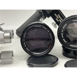 Collection of Canon lenses, to include 'Canon Lens FD 100mm 1:2.8', serial no 12821, 'Canon Lens FD 200mm 1:4' serial no 245313, 'Macro Canon Lens FL 50mm 1:3.5', serial no. 25505, 'Canon Lens FD 135mm 1:3.5 etc, together with other Canon equipment, including Bellows FL, Slide Duplicator etc 