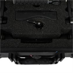 Wooden Camera handheld kit, comprising shoulder pad, two hand grips, two rosette extensions and rosette adapter, contained within a Peli 1400 case