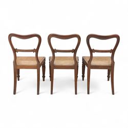 Gillows - Set of six mahogany dining chairs, each with curved top rail carved with floral medallion and scroll detail, fluted front supports, caned seats, the seat rail underside stamped HH identified as H. Howse an apprentice cabinetmaker at Gillows.