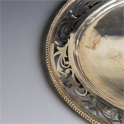 Indian silver waiter, of oval form with pierced foliate decoration, W31cm