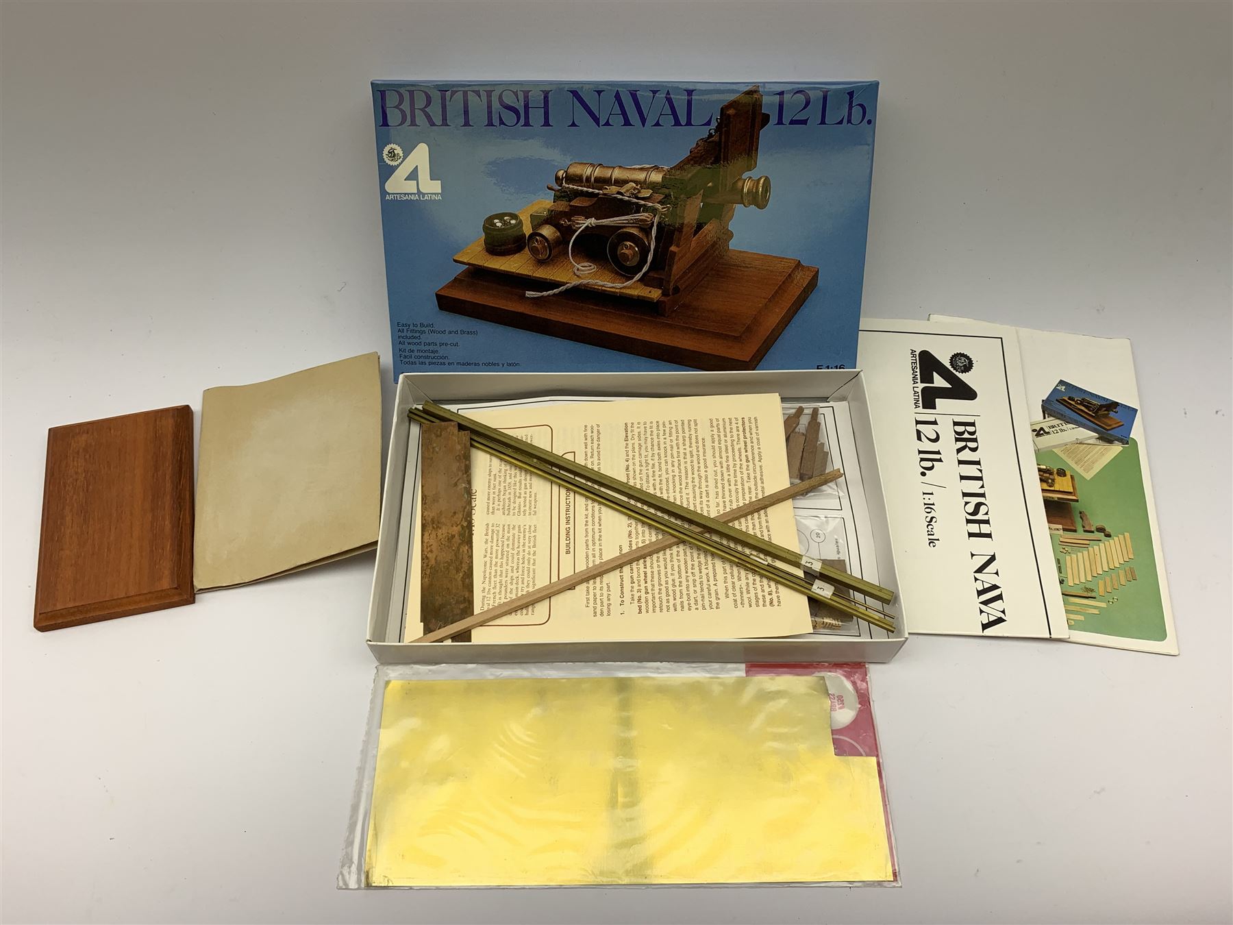 Three Artesania Latina wood and brass model kits of cannons including British 9lb, Naval 24lb and British Naval 12lb; all boxed with instructions and components in factory sealed transparent packaging (3)