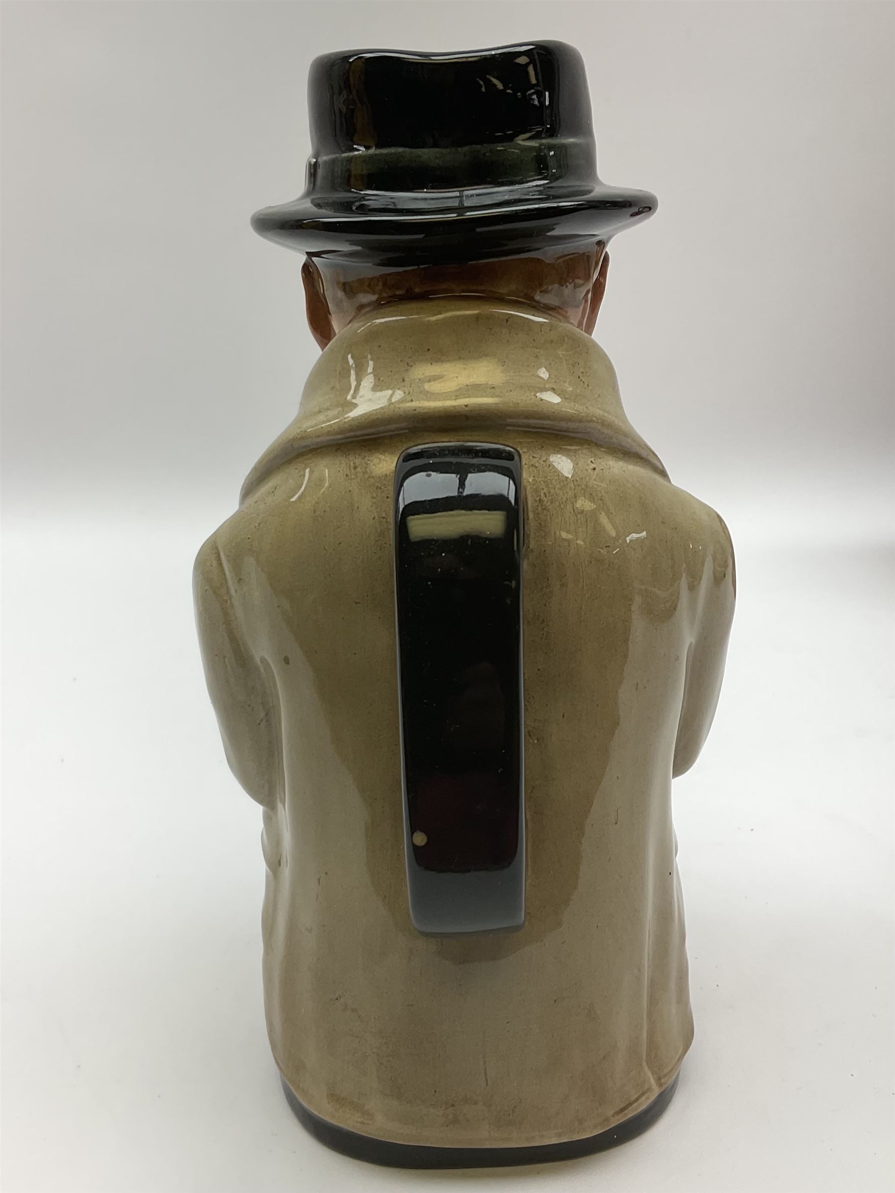 Royal Doulton toby jug of Winston Churchill H23cm and large character jug of Falstaff; together with four collector's plates by Royal Crown Derby, Royal Worcester and Limoges (6)