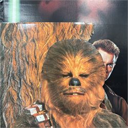 Star Wars Chewbacca cardboard cut-out, together with a Star Wars Phantom Menace Playstation advertising cardboard cut out, tallest H150cm