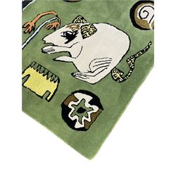 Shrimps for Habitat - 'Wilder' hand tufted green ground rug decorated with abstract motifs of animals, faces, shells and houses 