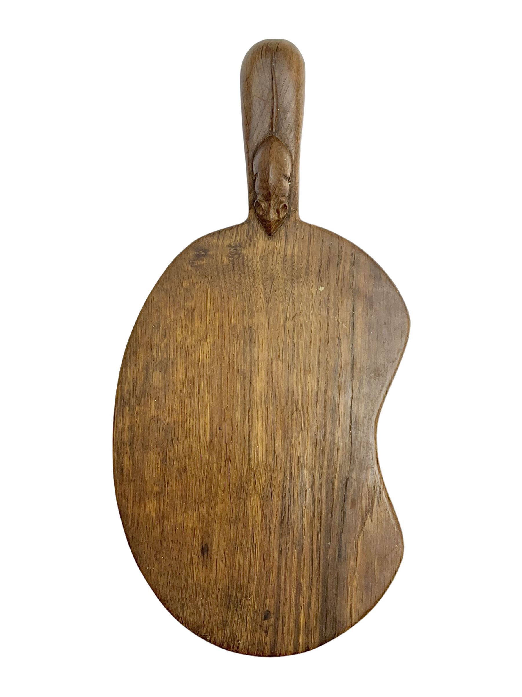 Mouseman - oak kidney-shaped cheeseboard, the handle caved with mouse signature, by the workshop of Robert Thompson, Kilburn 
