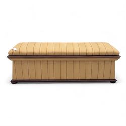 Late Victorian angular framed mahogany bay window seat, hinged lid with moulded upholstered padded seat, over upholstered front and sides, raised on compressed bun feet  