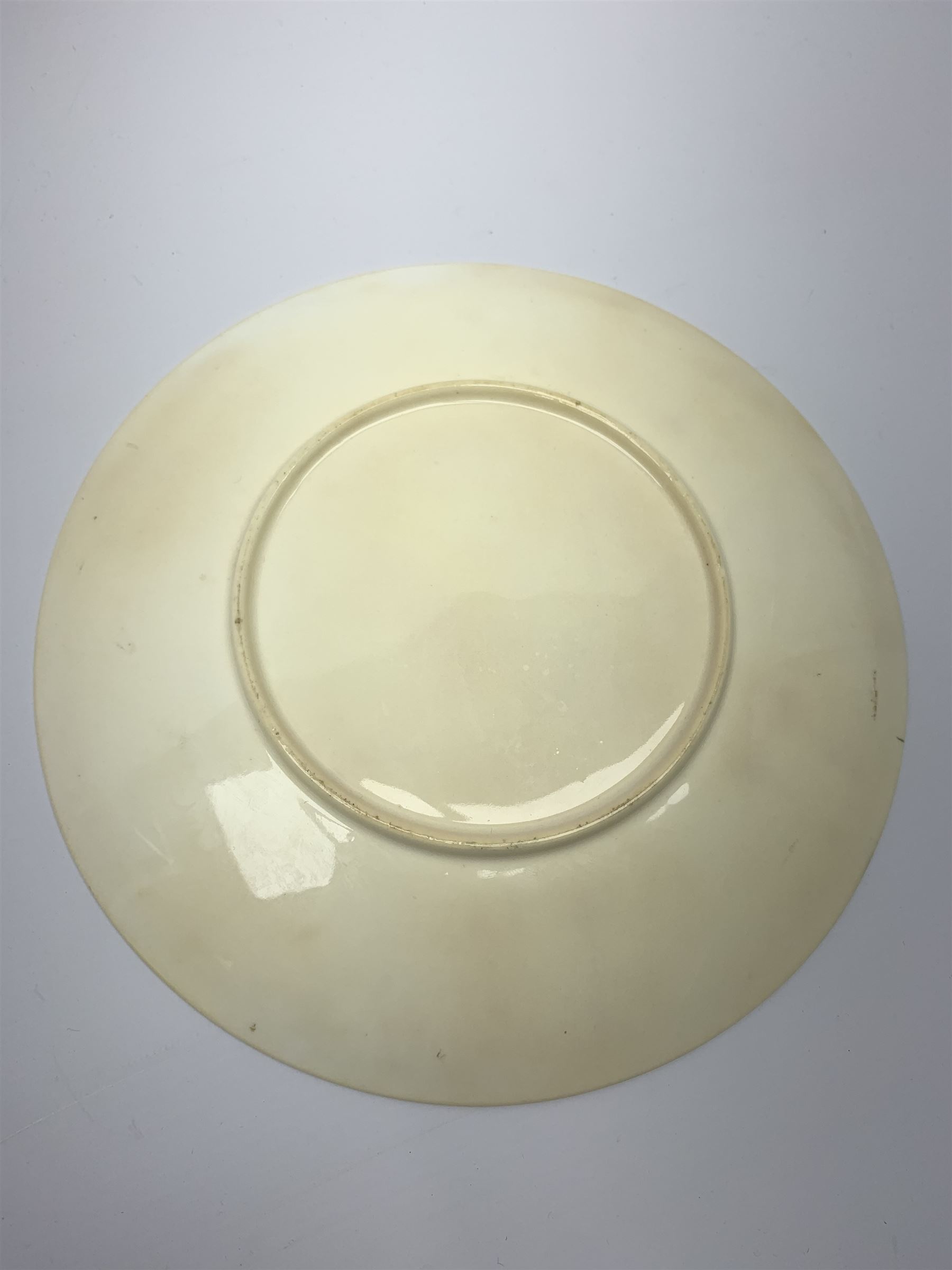 Late 19th century porcelain plate, hand painted by Frederick Sutton, depicting a female figure and putto within a wooded landscape, with recumbent sheep and brook to the fore, signed F N Sutton, unmarked verso, D22.5cm

Frederick Sutton was employed as a painter at the notable factories of Royal Worcester, Coalport, and Minton. 