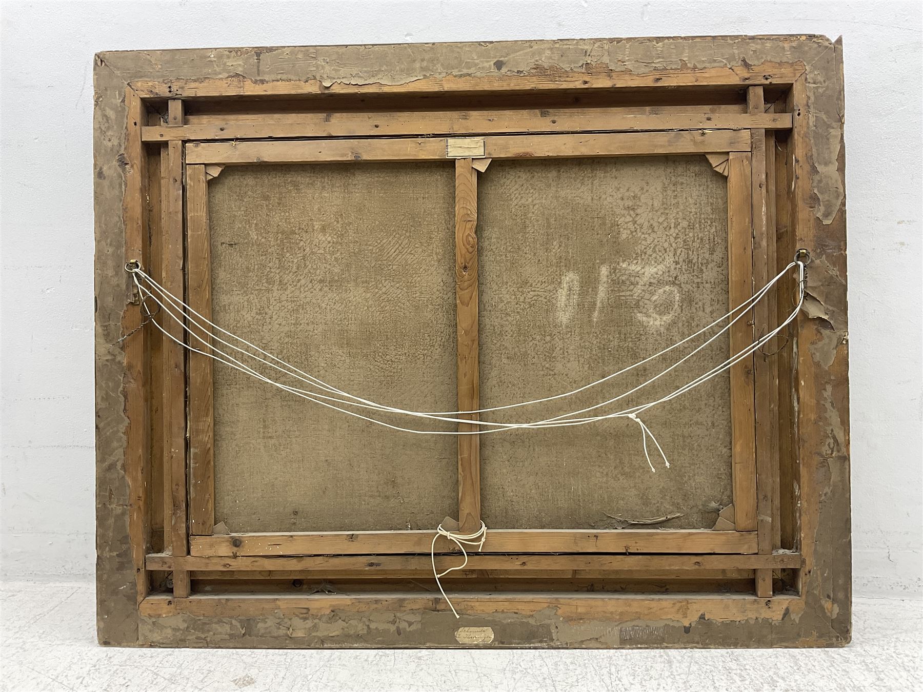 A Wilkow (Polish 19th/20th Century) Blacksmith's Workshop in a Winter Landscape, oil on canvas signed 71cm x 97cm in heavy ornate plaster gilt frame