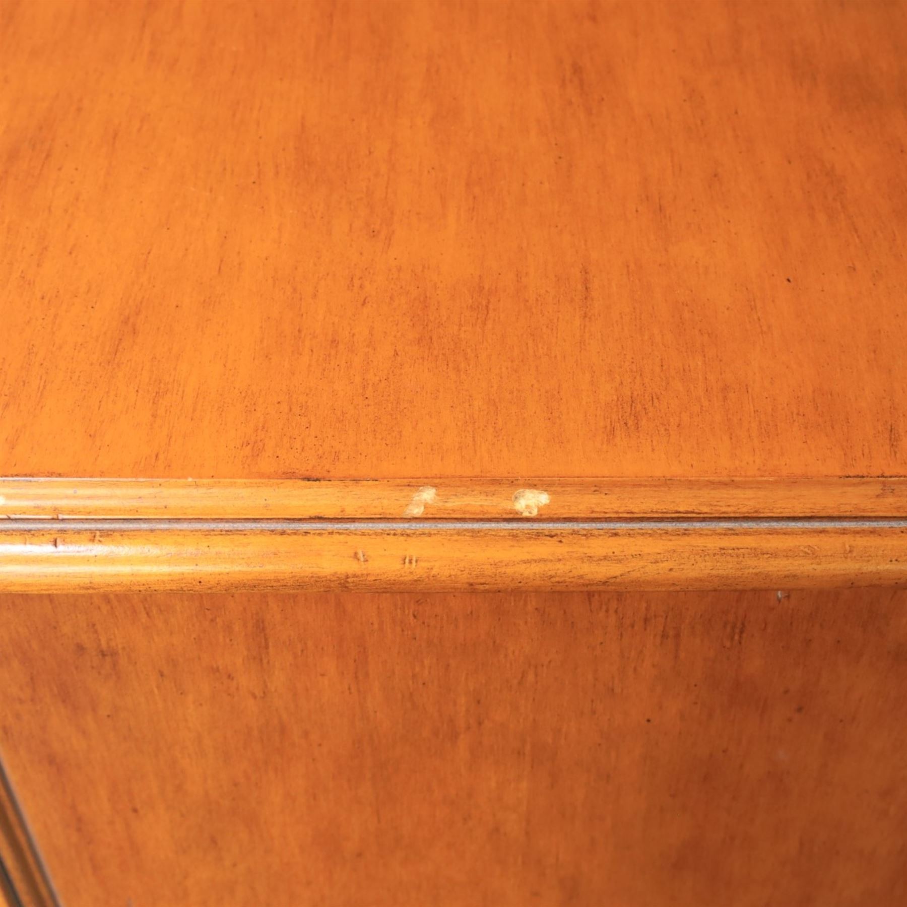 And So To Bed - 'Louis XV' large cherrywood chest, bowed shaped top above three long graduating drawers, blackened metal handles and escutcheons, raised on scrolled supports with carved foliate knees 