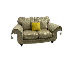 DFS - two seat sofa (W160cm, H90cm, D95cm), and armchair (W103cm), upholstered in pale gold fabric decorated with scrolling foliate pattern, with scatter cushions and arm covers