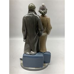 Lladro figure, Sad Parting, modelled as a man and woman with suitcases, sculpted by Francisco Catalá, with original box, no 5583, year issued 1989, year retired 1991, H33cm