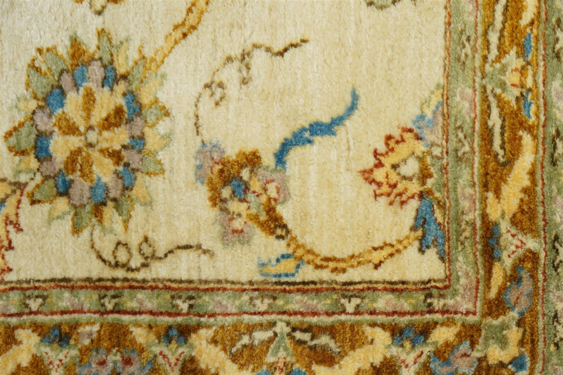 Modern Pakistani Oushak style hand-knotted runner,  ivory field with an all-over scrolling floral vine design incorporating stylized palmettes and rosettes in soft tones of pale blue, sage green and muted gold, enclosed by conforming border, cotton fringe ends 