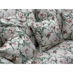 Early 20th century two seat settee with drop arm, upholstered in Sanderson 'Absalon Minor' fabric, loose covers and cushions, white ground with overall floral design