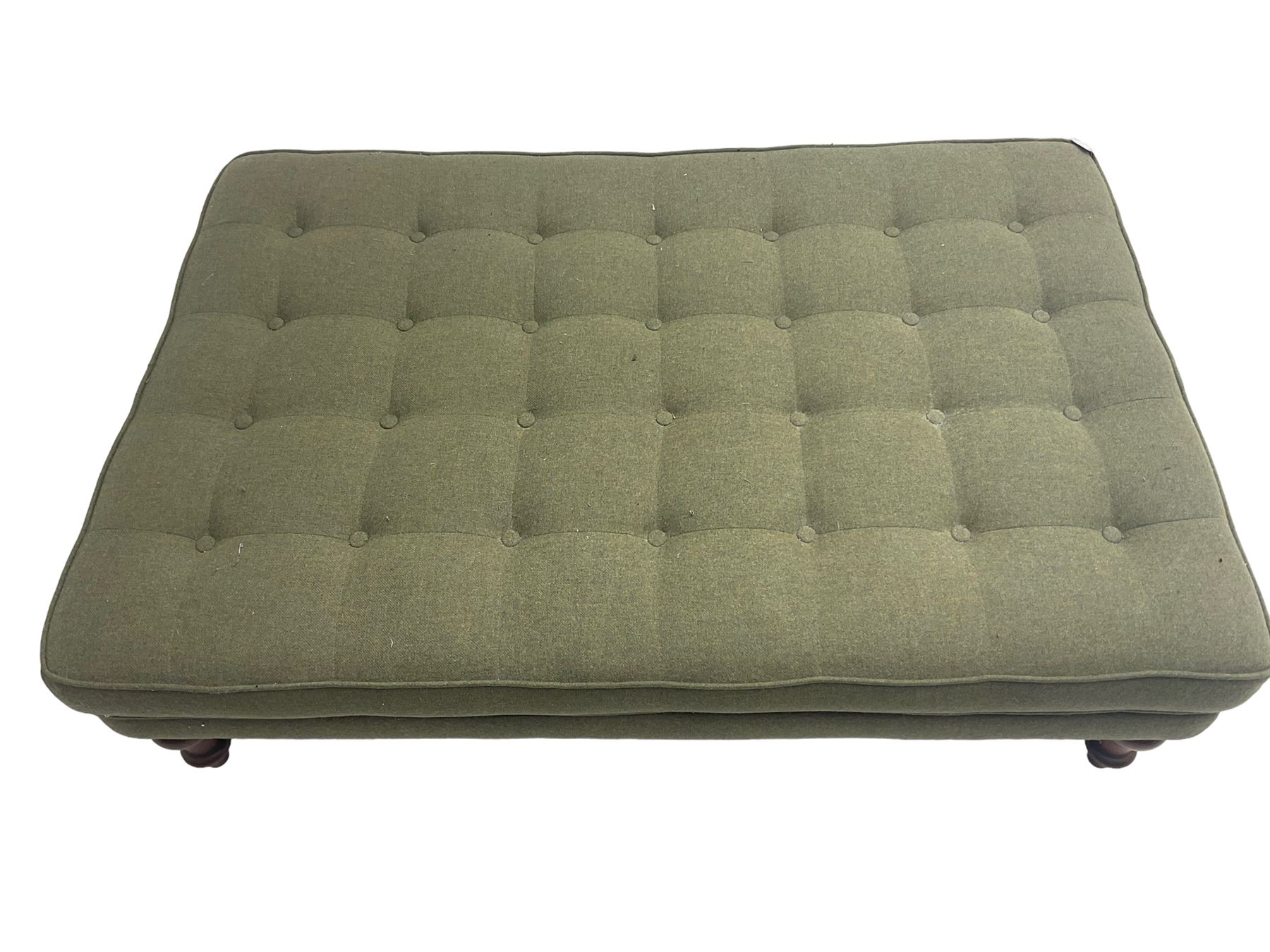 Peter Silk of Helmsley - large rectangular footstool upholstered in buttoned green tweed fabric, on turned mahogany feet