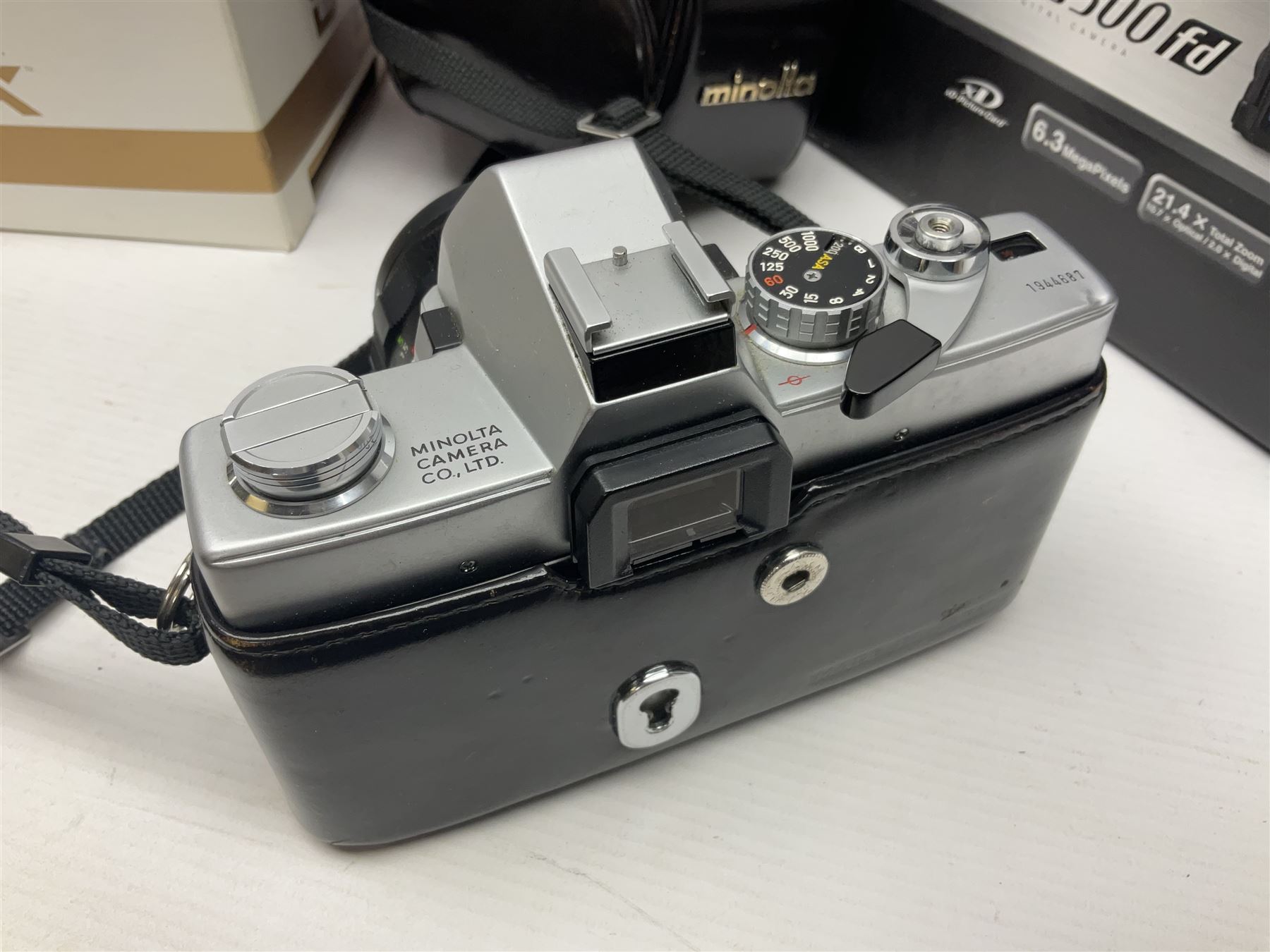 Minolta Dynax 5xi camera body serial no 17222646 with 'AF Zoom Xi 28-80mm 1:4(22)-56' lens serial no 17220881, Minolta SRT101 camera body serial 1944687, Lumix camera body serial no K6SC10168 etc 