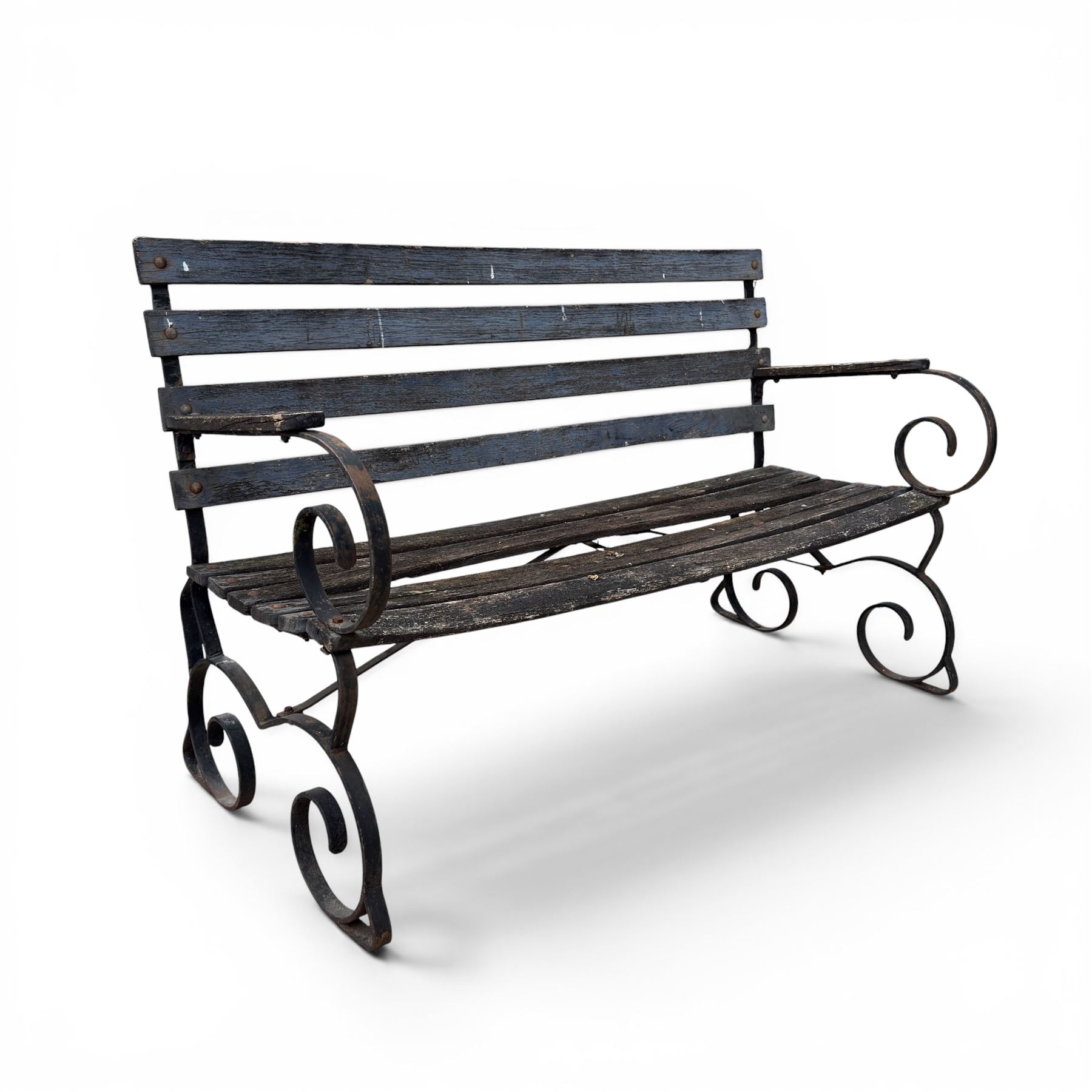 19th century wrought iron strapwork and slatted wood garden bench, the arm terminals and end supports of scrolling form