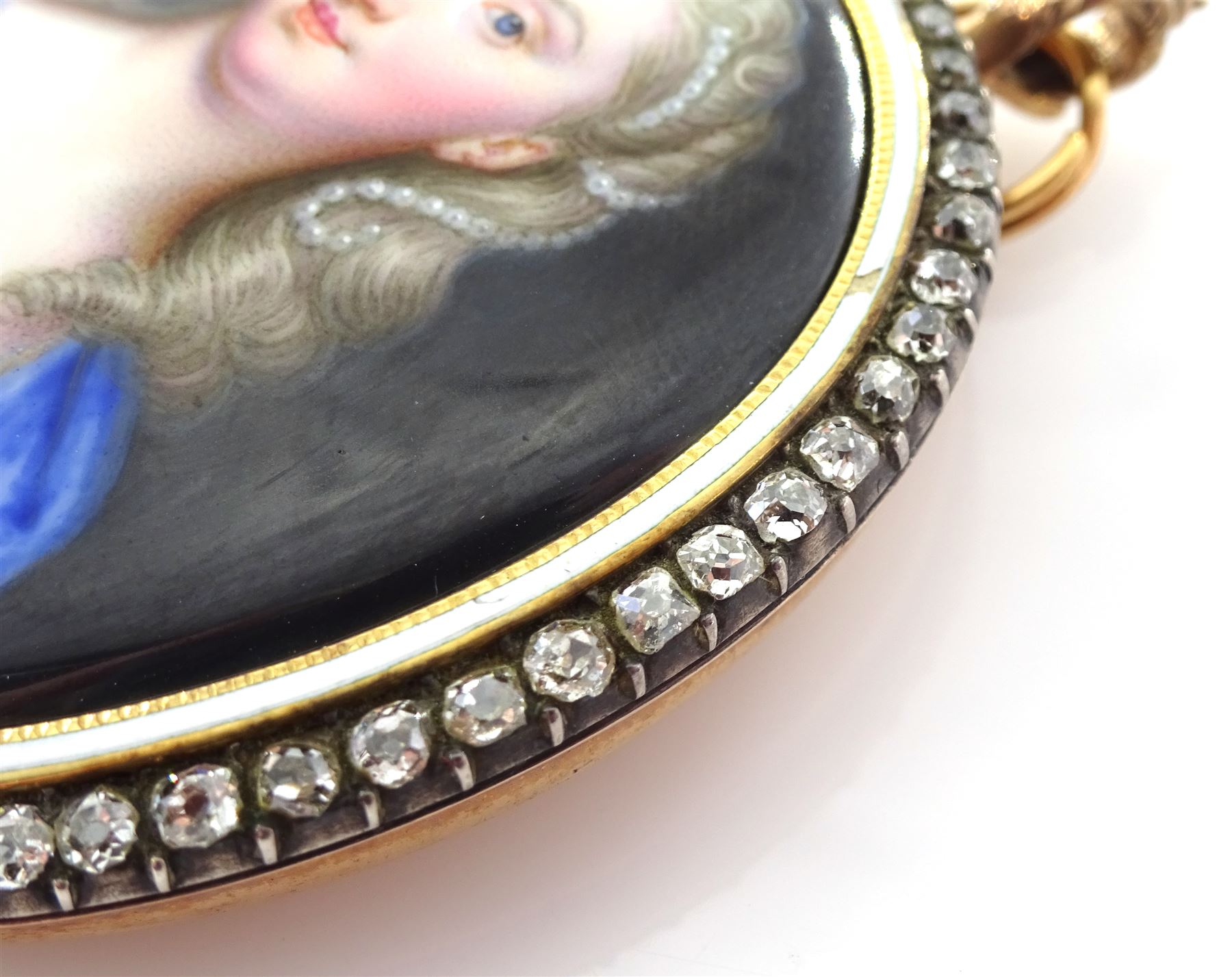 Christian Friedrich Zincke (German 1683-1767)
Portrait miniature upon enamel, circa 1750
Head and shoulder portrait of a young woman in blue gown, her hair adorned with pearls 
Within gilt frame, with old cut diamond border and white enamel inner border 
Oval 4.5cm x 3.5cm

Provenance
Purchased by the current vendor from Judy & Brian Harden Antiques September 98

Born in Dresden in 1683, Christian Friedrich Zincke travelled to London in 1706 to work at the studio of miniature painter and enamellist Charles Boit; later inheriting Boit's fashionable clientele. 
During his time in London Zincke is said to have dominated the market, training a number of well known English miniature painters including William Prewett, and also gaining Royal patronage aided by the endorsement of notable portrait artist Sir Godfrey Kneller.
Zincke worked extensively for the Royal Family, including George II and Frederick Prince of Wales, and is arguably the most successful enamel painter of the period in which he worked. 


