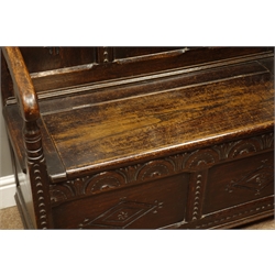  20th century oak settle, lozenge carved panel back and front, with plain lid and shaped arms, W91cm, H112cm,, D46cm  