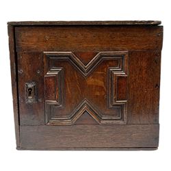 17th/18th century oak spice cabinet, the geometric moulded door opening to reveal a fitted interior with six drawers with ring handles, H29cm L33cm D20cm