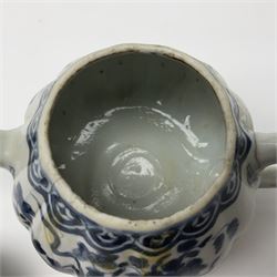18th century Chinese blue and white teapot, painted with floral sprays, with lobed body and cover, H11cm
