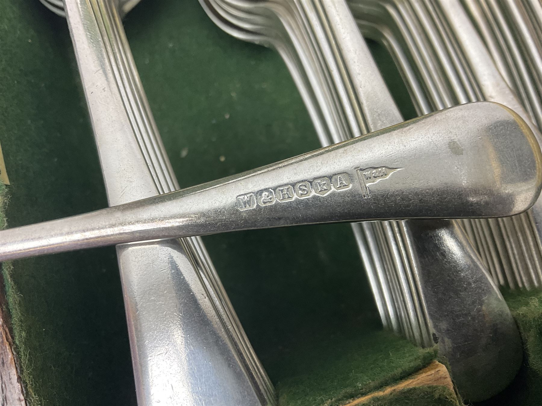 Walker and Hall silver plated canteen of cutlery, oak case, the hinged lid with a engraved brass shield , H12cm, L32cm