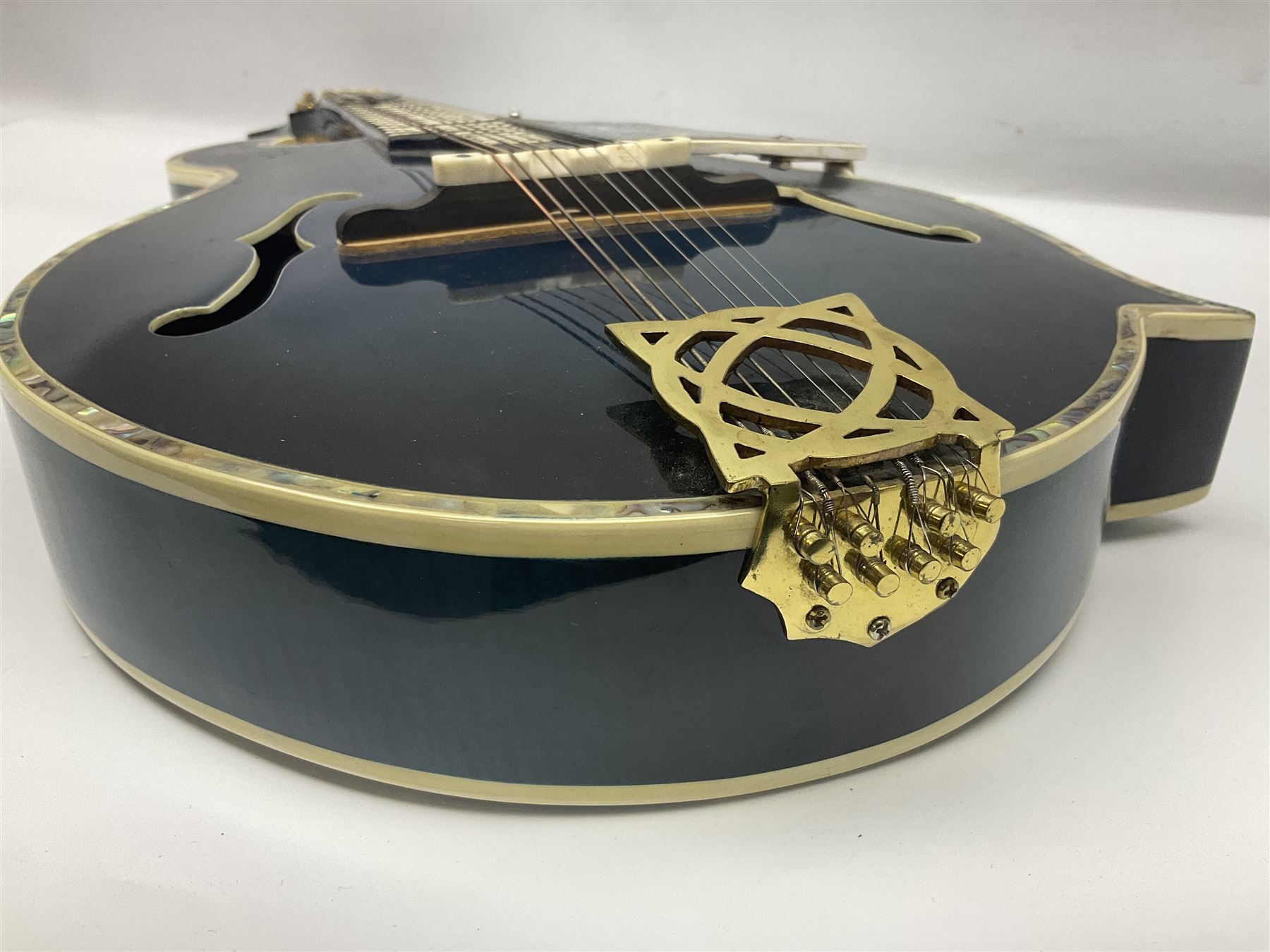Eastern eight-string F-hole mandolin with blue sunburst finish and mother-of-pearl inlay of flowers and birds L69cm