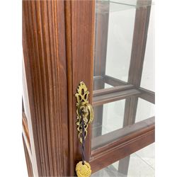 Classical mahogany finish narrow display cabinet, mirror back, glass shelves