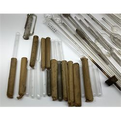 Collection of 19th century and later pharmaceutical laboratory glass, to include, thistle funnels, volumetric pipettes, used and unused test tubes, burettes, etc, (42+) Provenance: discovered in the storeroom of a long established Hull pharmacist and opticians 